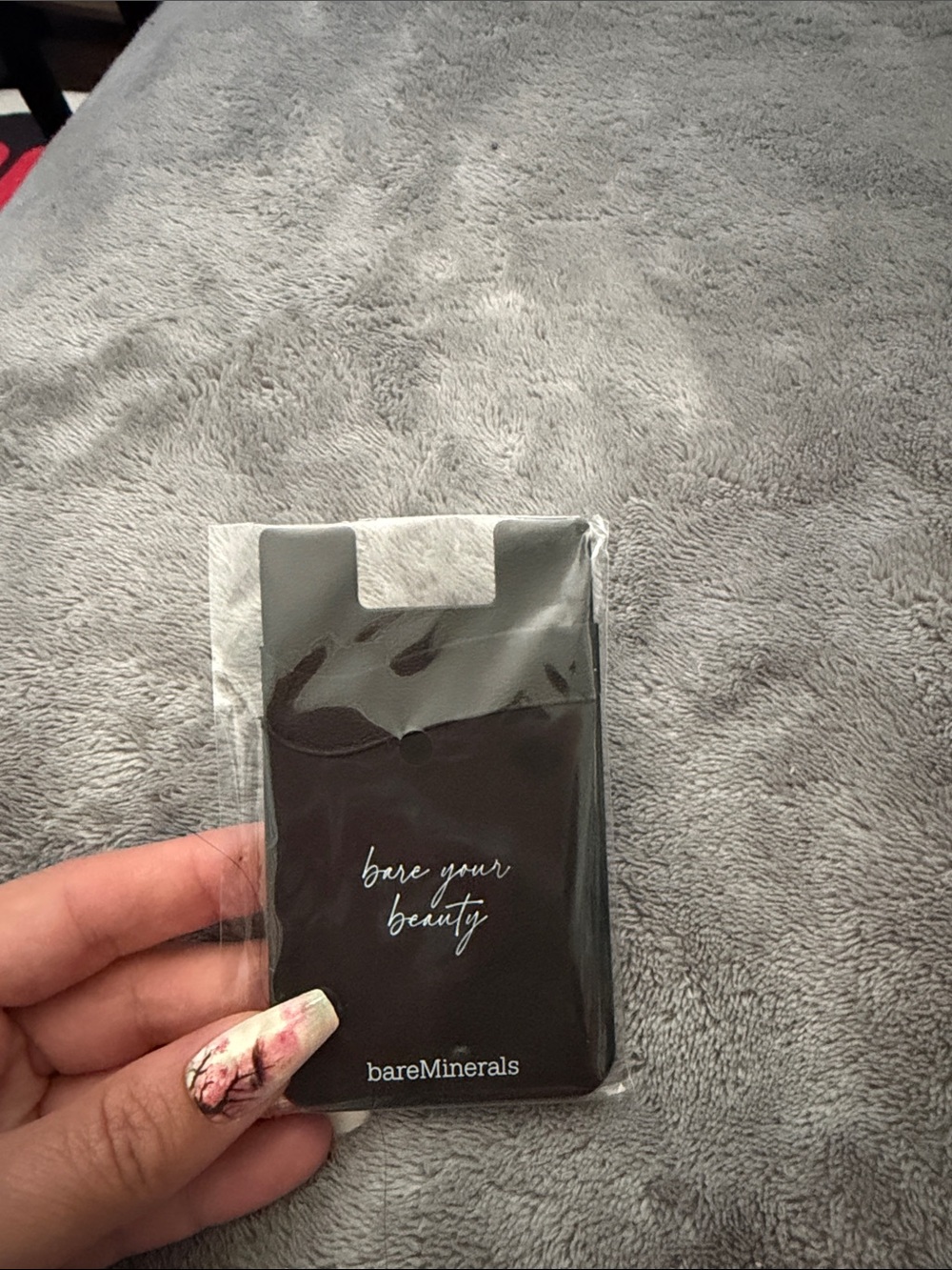 bareMinerals Black Silicone Phone Card Sleeve with "bare your beauty" Script